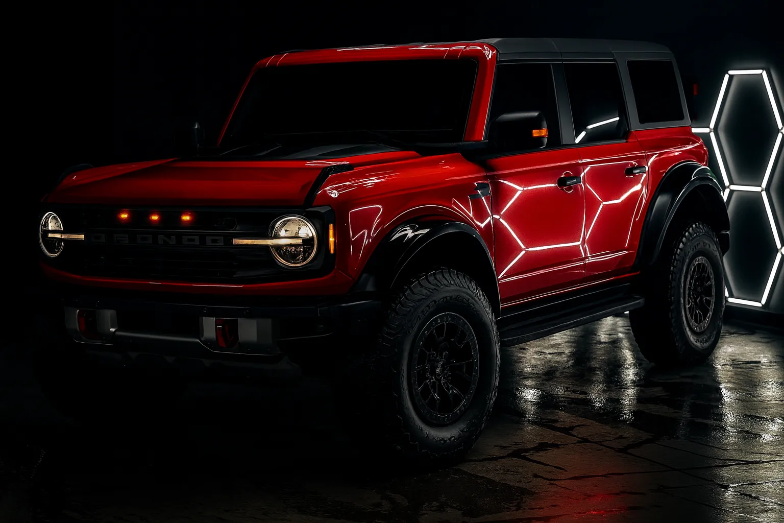A red Ford Bronco with a fresh ceramic coating reflecting the studio's hexagon lights