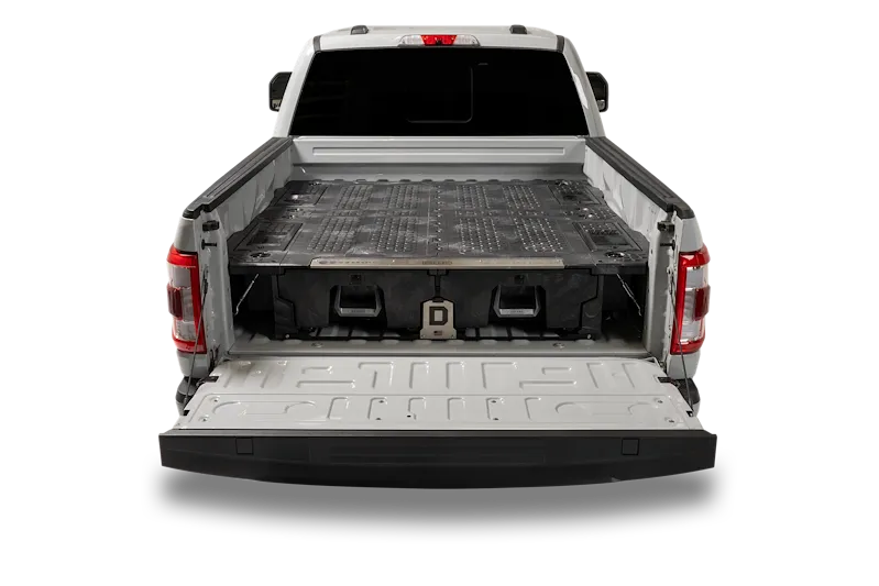 A DECKED two-drawer storage system fitted in the bed of a silver Ford F-150 with the tailgate down